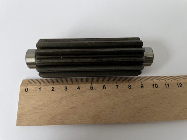 TRANSMISSION PINION